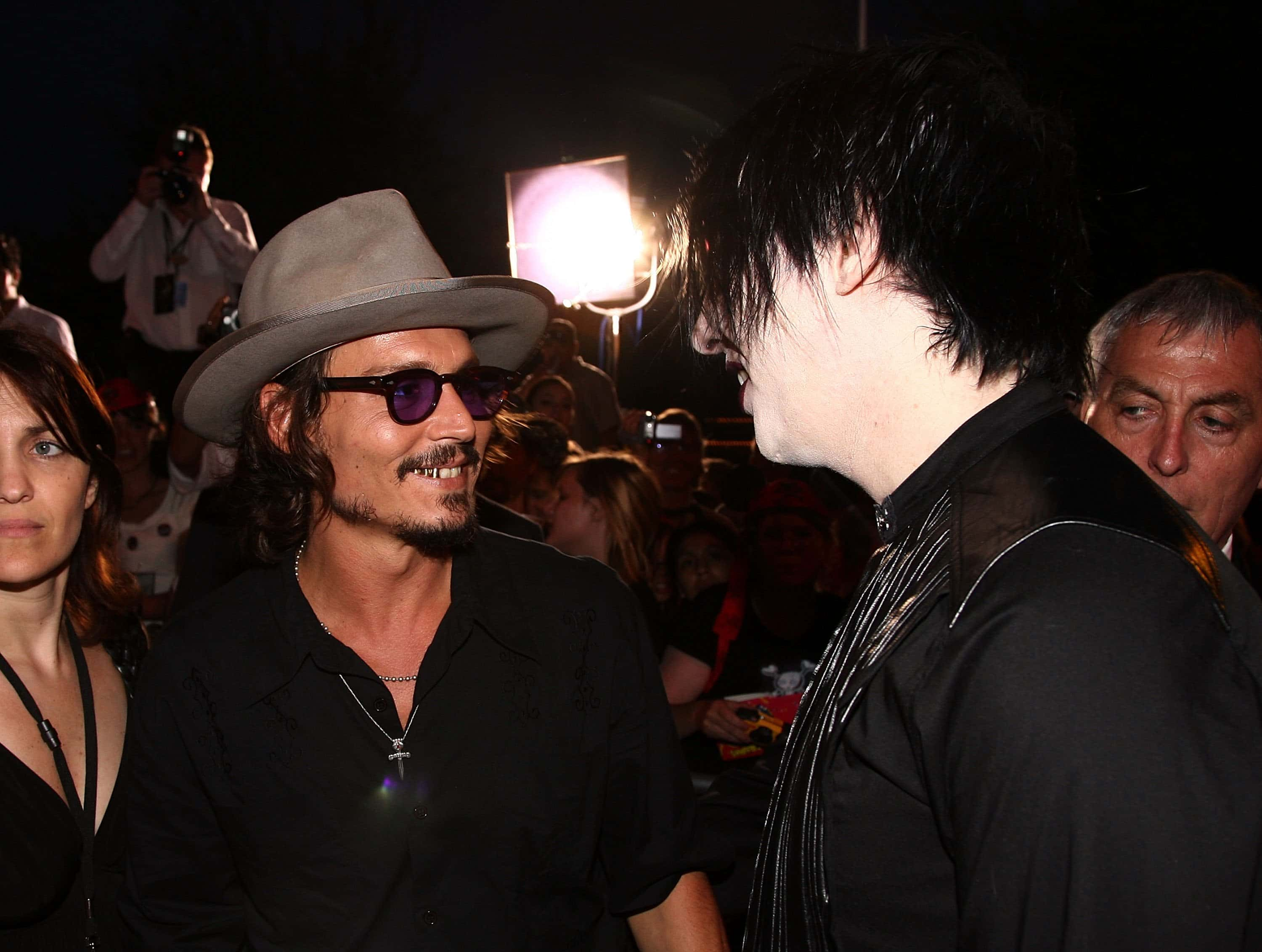 <b>Johnny</b> <b>Depp</b> (L) and Musician <b>Marilyn</b> <b>Manson</b>.