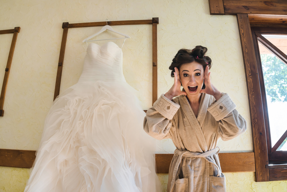 shocked bride in bathrobe   screaming because she changed her mind
