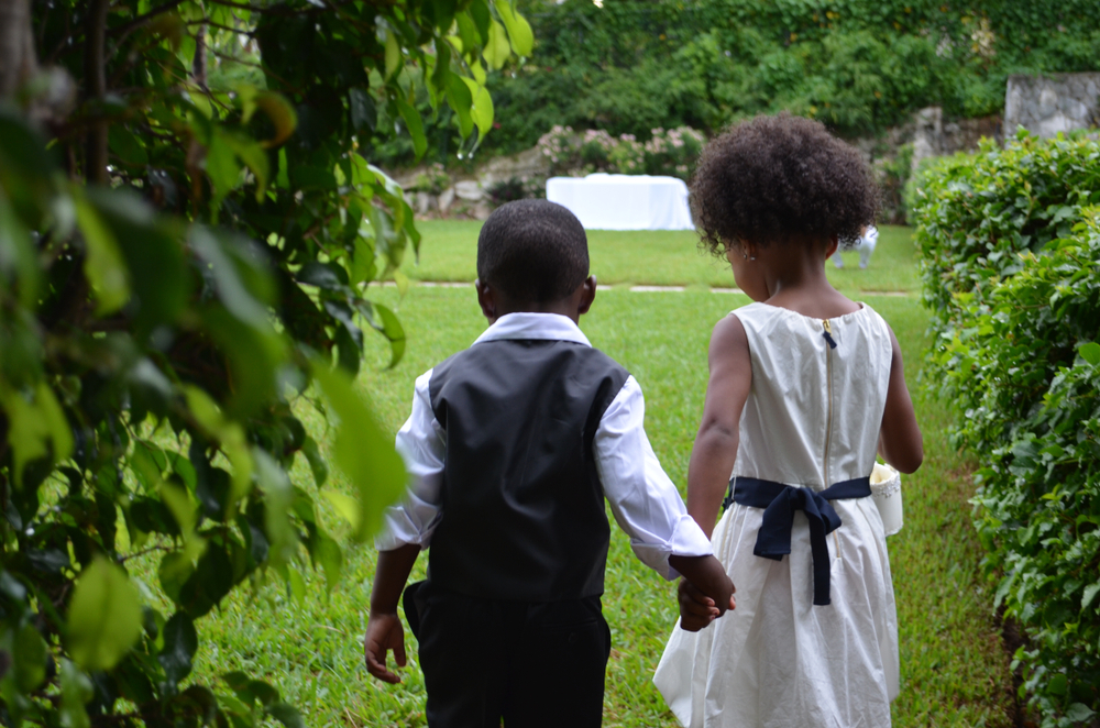 Cute flower girl and ring bearer, children in a wedding