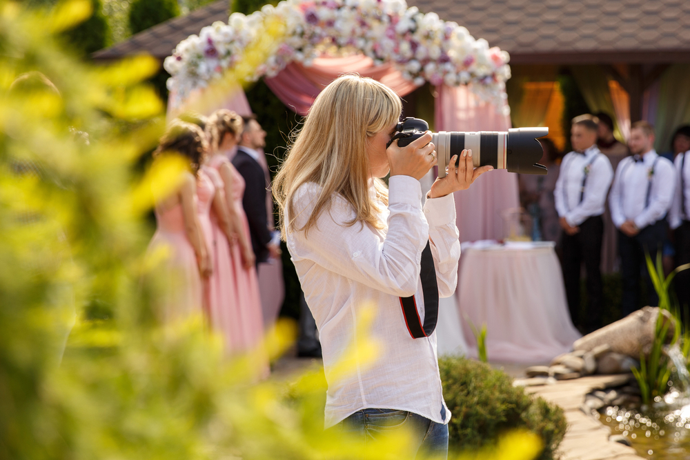 Wedding photographer with a professional camera