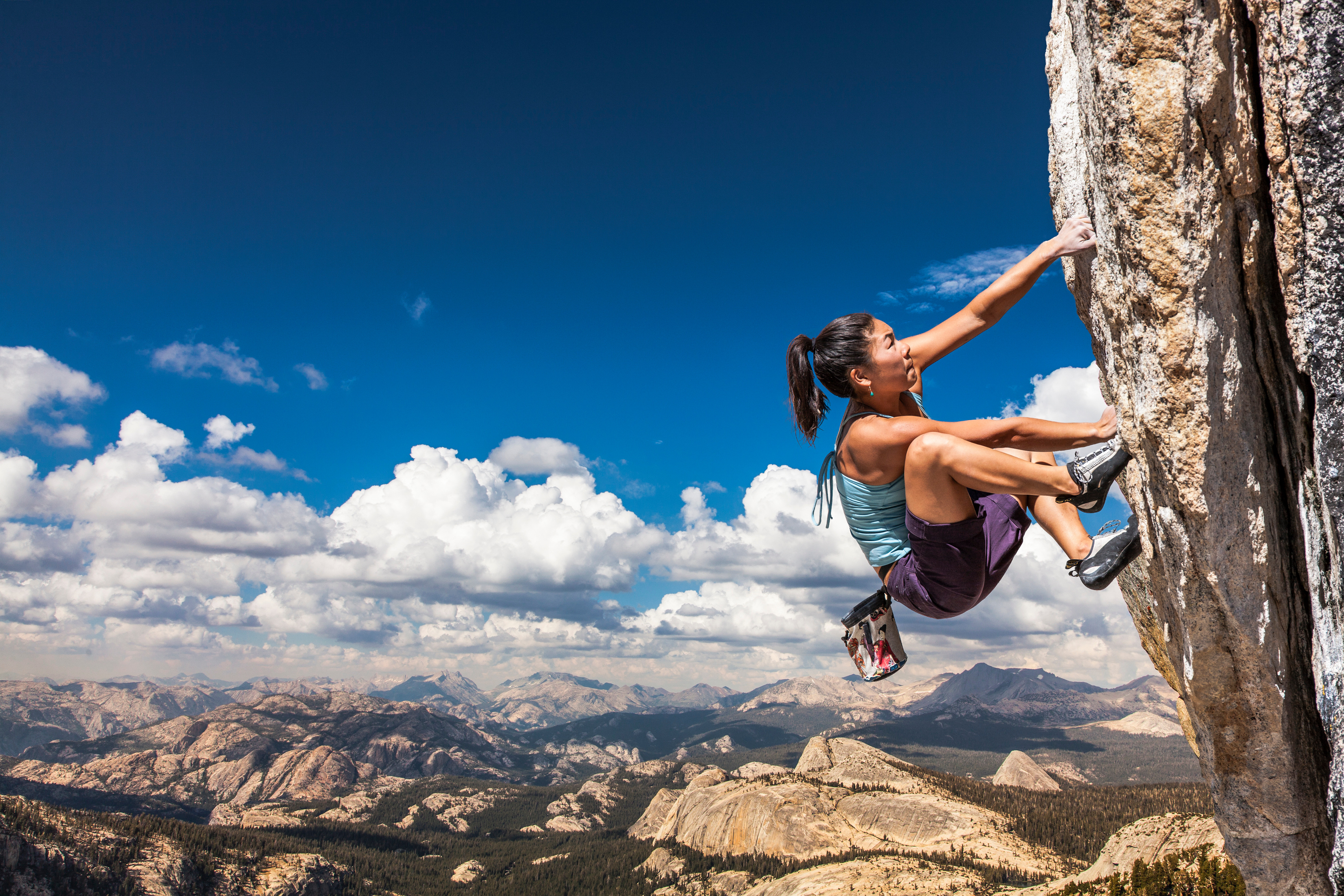 A woman rock climbing