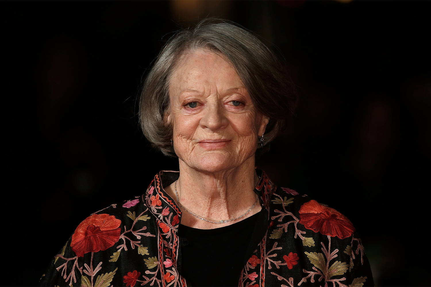 Maggie Smith arrives at 