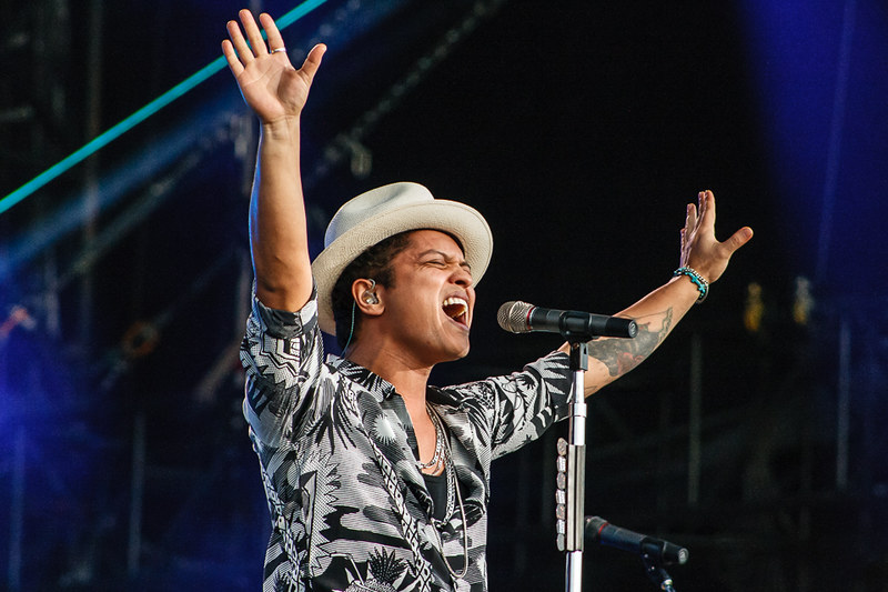 Bruno Mars wearing a black and white shirt