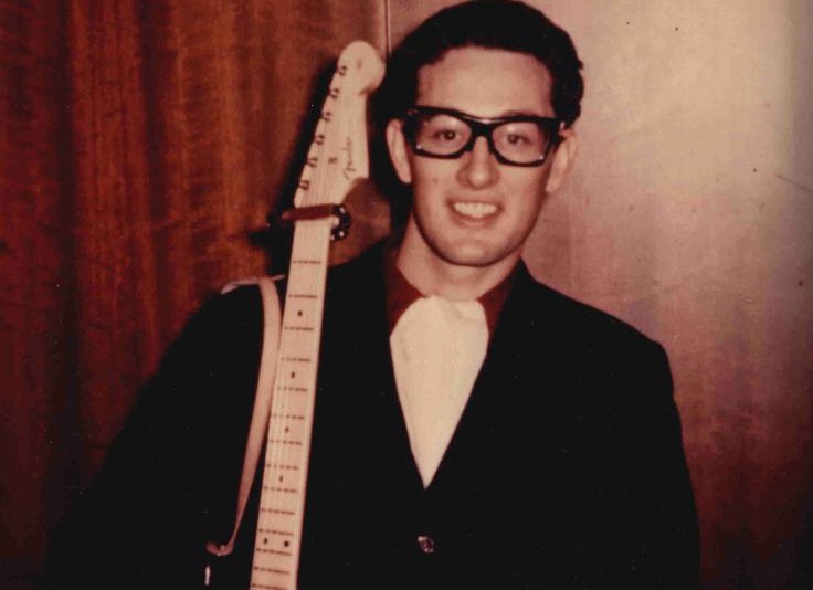 Buddy Holly with a pair of glasses