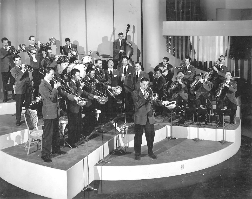 Glenn Miller and His Orchestra performing live on the stage