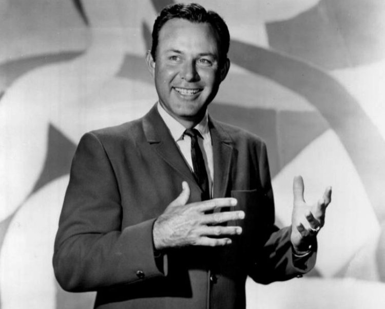 Jim Reeves wearing a suit