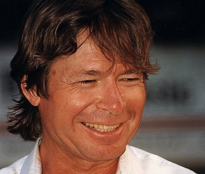 John Denver in a white shirt