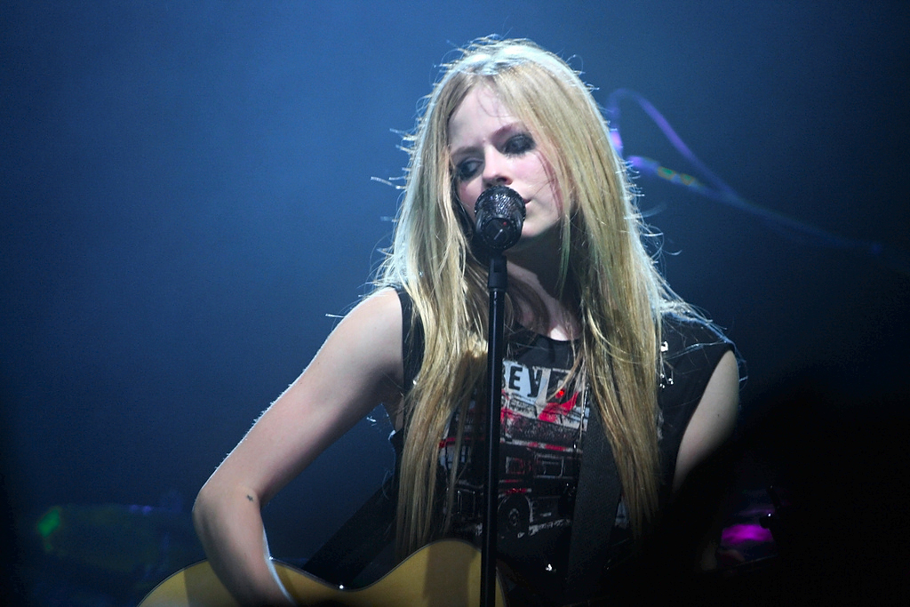 Avril Lavigne wearing a black top